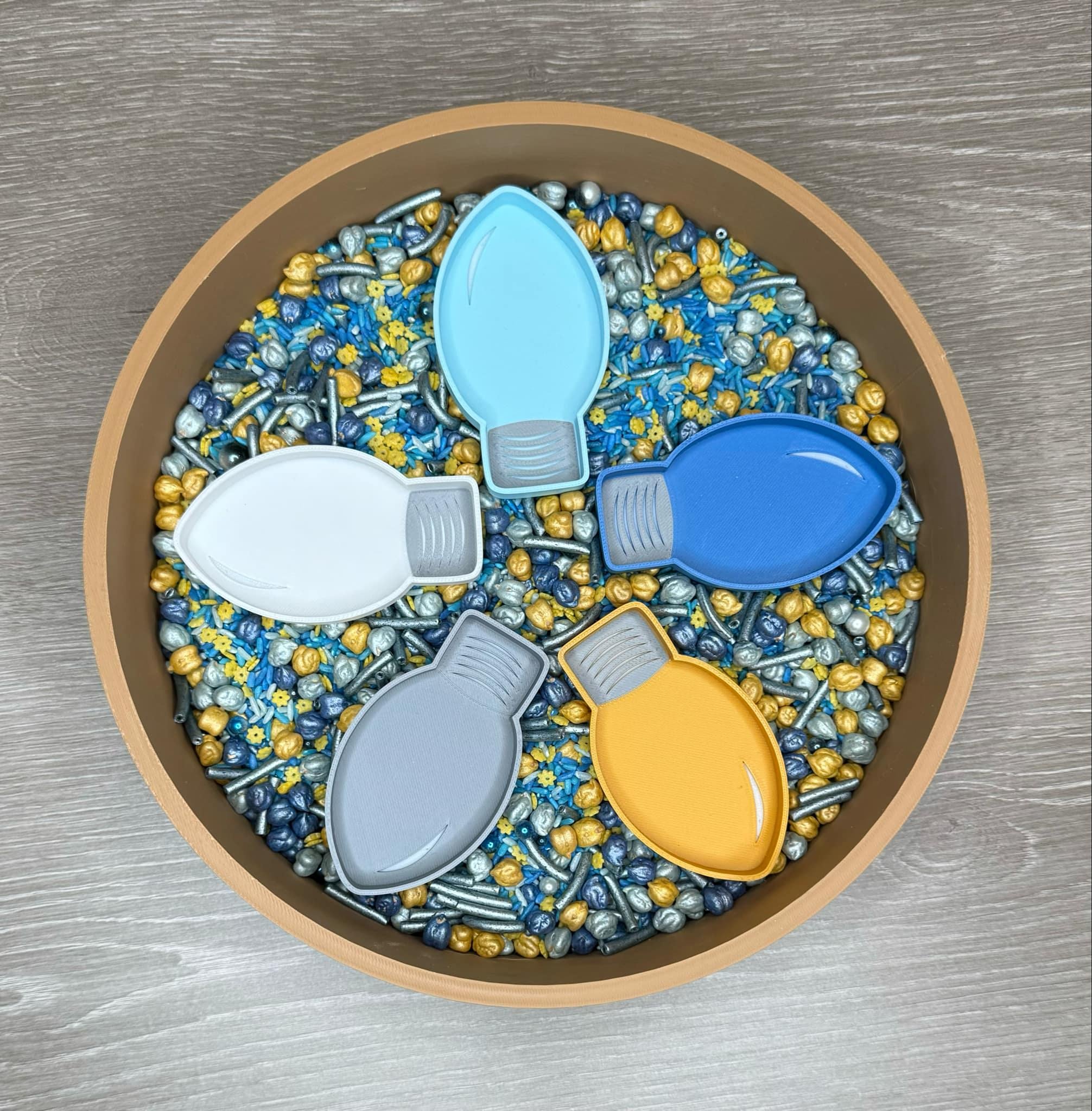 Hanukka light sensory trays, Hanukkah light sensory trays, holiday light bulb sensory activity, sensory play lights, light bulb trays